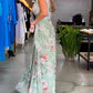 Rochie elegantă fără mâneci cu imprimeu floral și decolteu ascuțit