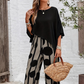 Set compus dintr-un top cu mâneci ¾ și pantaloni cu model
