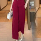 Top cu mânecă scurtă cu gât în V și pantaloni cu picioare largi asortați (set din 2 piese)