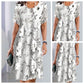 🌹 Rochie elegantă cu decolteu rotund și imprimeu floral lejer cu mâneci scurte